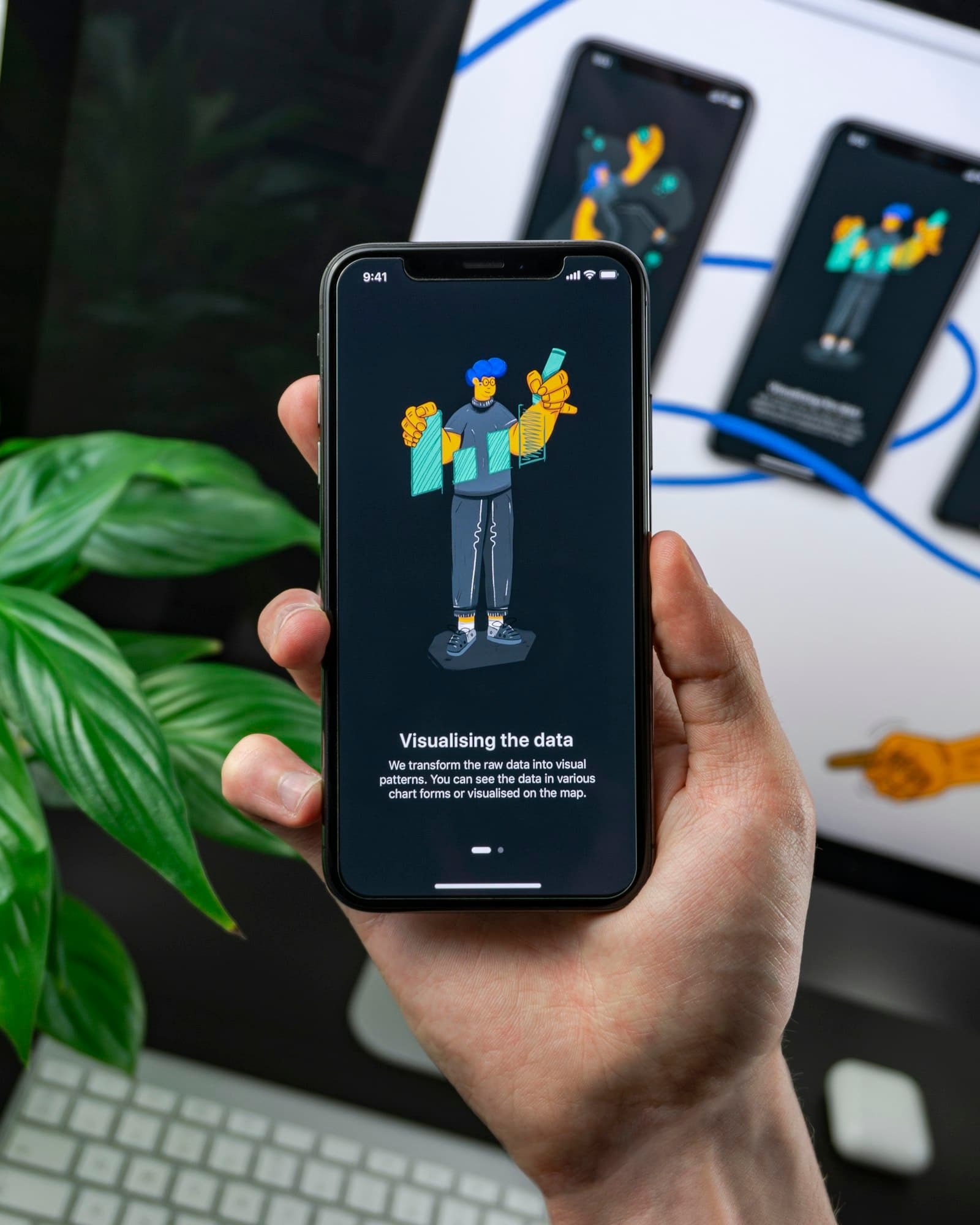 An app open on a phone held in one hand